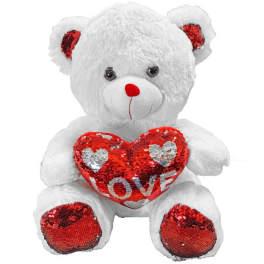 White teddy bear holding a red sequined heart with the word LOVE