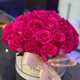 Pink roses in a box