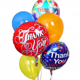 Cluster of colorful thank-you balloons on sticks