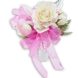 White rose corsage with pink ribbon and white accents