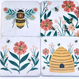 Set of four bee and flower coasters with a beehive design
