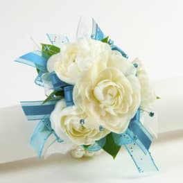 White rose bouquet with blue ribbon accents