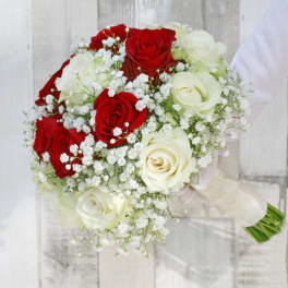 Bouquet of red and white roses with baby's breath