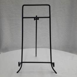 Black metal display stand on a white surface