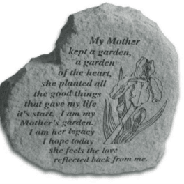 Engraved memorial stone with a flower illustration and poem text