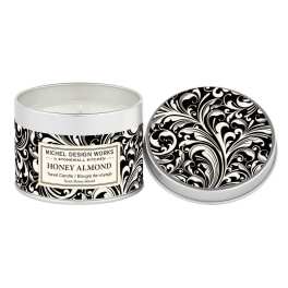 Travel candle in a decorative tin with a matching lid