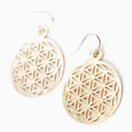Pair of round cutout metal earrings on a white background
