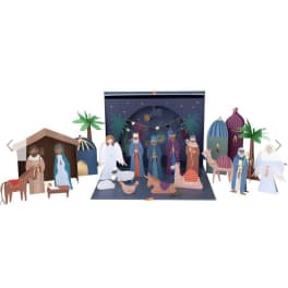 Paper nativity scene with figures, animals, and a starry backdrop
