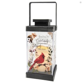 Decorative lantern with a cardinal and floral print