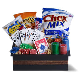 Gift basket with snacks, poker chips, and playing cards