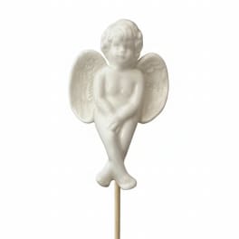 White angel figurine on a wooden stick