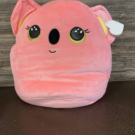 Pink plush koala toy with glittery eyes and a heart tag