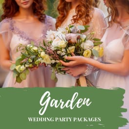Bridesmaids holding pastel wedding bouquets with roses and greenery