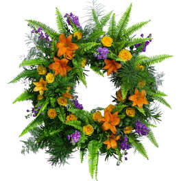 Green fern wreath with orange lilies, yellow roses, and purple flowers