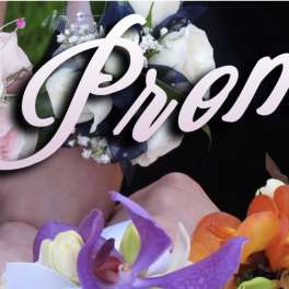 Floral corsages with pink roses and orchids, overlaid with the word "Prom"
