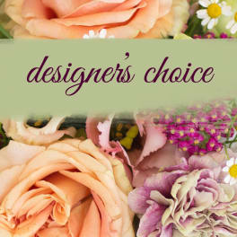 Close-up of mixed pastel flowers with the words designer's choice across the center