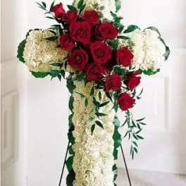 Standing floral cross with red roses and white carnations