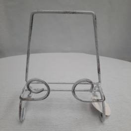 White metal display stand with curled front supports