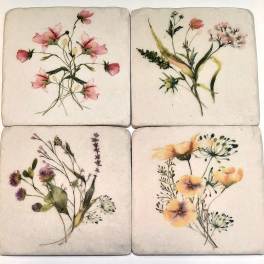 Four square floral coasters with watercolor-style wildflower designs