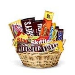 Basket of assorted candy bars and snack packs