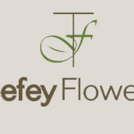 Teefey Flowers logo on a beige background
