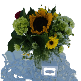 Sunflower bouquet with green and white blooms in a glass vase