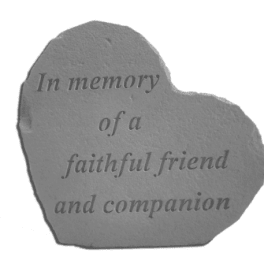 Heart-shaped memorial stone with the words "In memory of a faithful friend and companion"