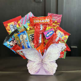 Candy bouquet in a lavender butterfly container