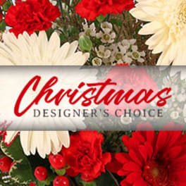 Red and white flowers with a Christmas designer's choice label