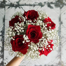 Bouquet of red roses with white baby's breath