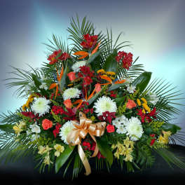 Large tropical floral arrangement with red, white, and orange blooms
