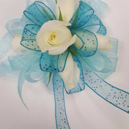 White rose boutonniere with blue ribbon loops