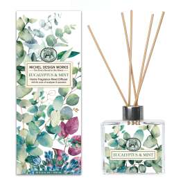 Eucalyptus and mint reed diffuser with wooden sticks in a clear glass bottle