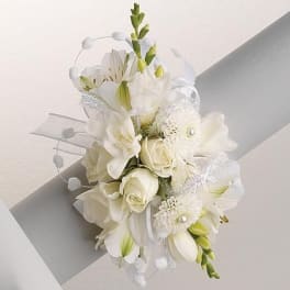 White bridal bouquet with roses, lilies, and calla lilies
