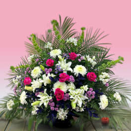 Large mixed bouquet with pink roses, white lilies, and chrysanthemums
