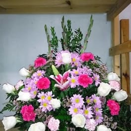 Large pink and white floral spray with lilies and daisies