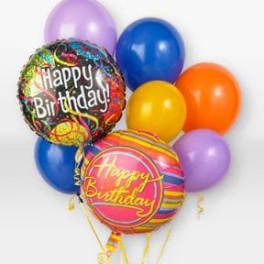 Cluster of birthday balloons in bright colors with two printed foil balloons
