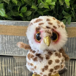 Plush owl figurine with glittery gold beak and feet