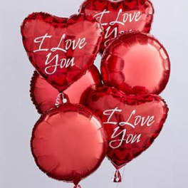 Cluster of red heart-shaped balloons with "I Love You" text