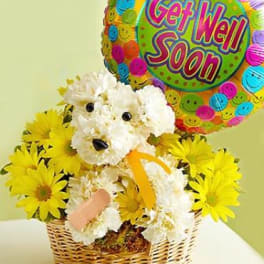 Basket of white teddy bear and yellow flowers with a "Get Well Soon" balloon