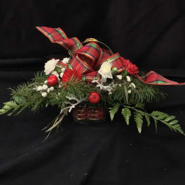 Holiday floral centerpiece with red plaid ribbon and white flowers