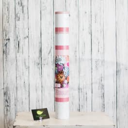 Tall floral gift tube with colorful flower artwork