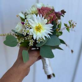 Handheld bouquet with white and pink flowers and eucalyptus