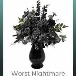 Dark floral arrangement in a black vase with the words "Worst Nightmare" below