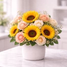sunflower and pink roses arrangement