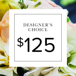 Designer's choice $125 card over a close-up of pastel flowers