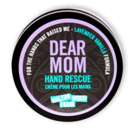 Round tin of Dear Mom hand rescue cream with lavender vanilla label