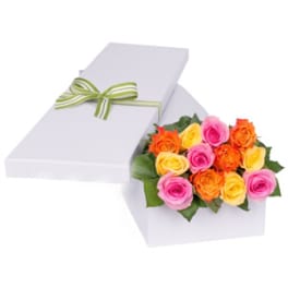 Box of multicolored roses with a striped ribbon