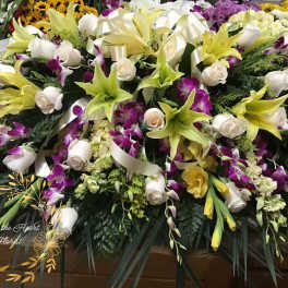 Orchid and Lily casket spray (FC10)