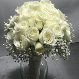 White rose bouquet in a glass vase